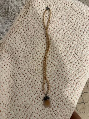 Long beaded necklace with sparkle stone